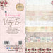 Dress My Craft Vintage Era 12x12 collection pack showing single-sided paper designs with antique postage stamps, vintage newspaper print, roses, and old-world maps.