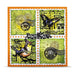AALL & Create A7 Acrylic Stamp – Song from Torino. Decorative postcard with vintage-style stamps featuring a butterfly, bird, and other elements on an orange border.